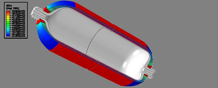 Supplied finite-element analysis view of a composite pressure vessel section, with the original color scale and legend.