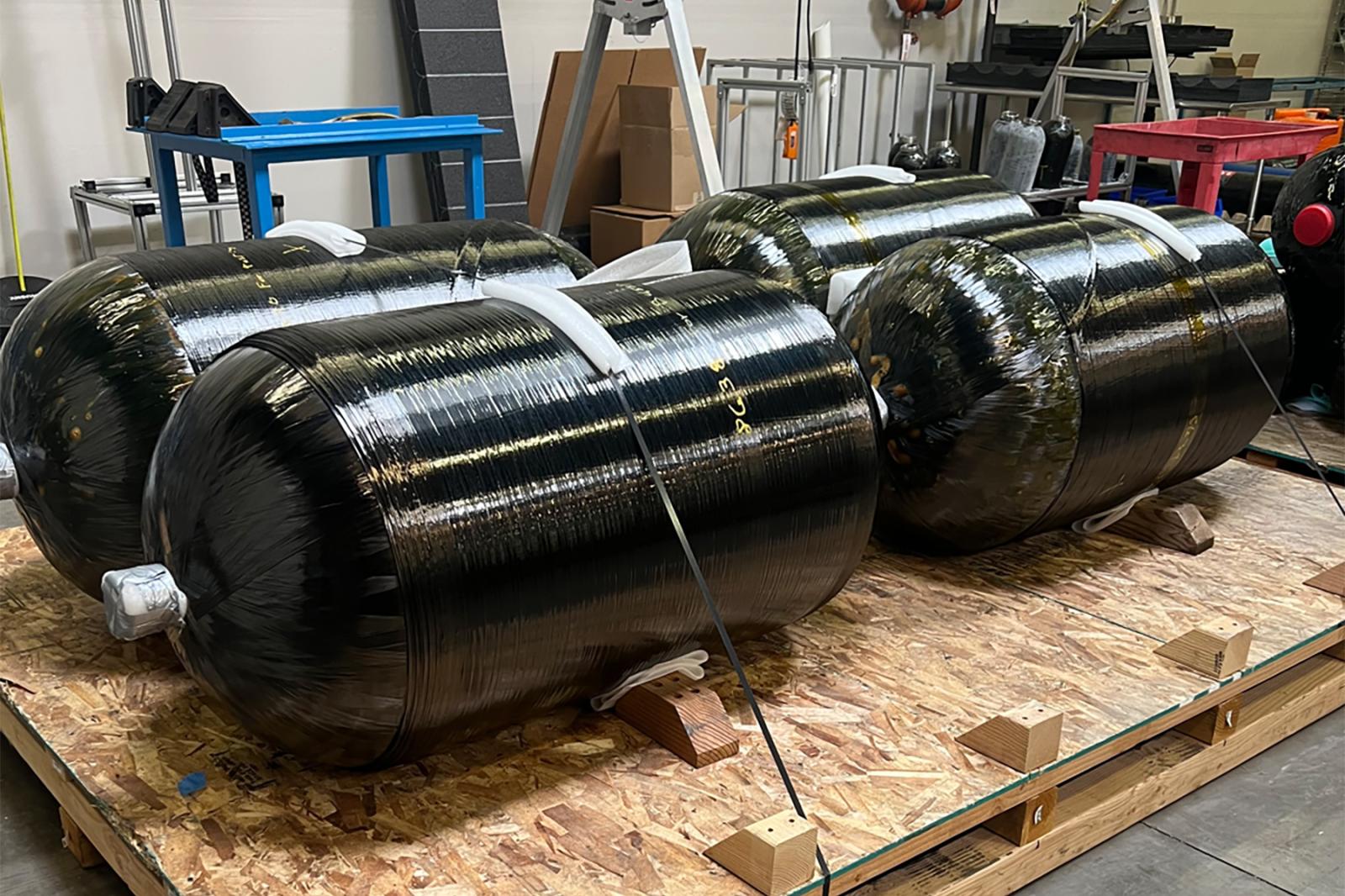 Large-diameter Type 4 composite pressure vessels, rated to 6000 psi, ready for prototype testing. Engineered for high performance and reliability, they are ideal for demanding applications.