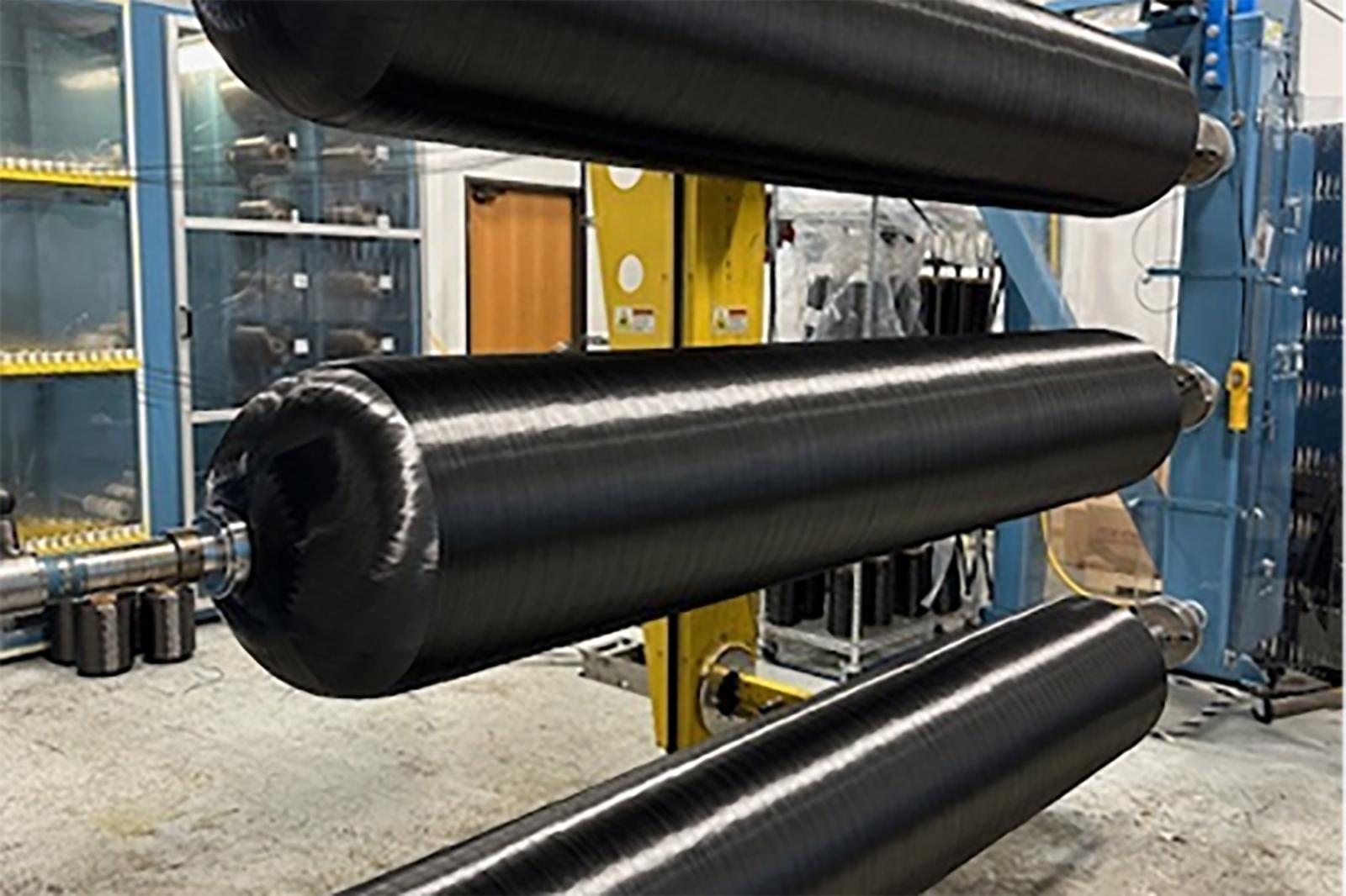 The 4-axis filament winding process precisely applies T700 carbon fiber to form composite overwrapped pressure vessels (COPVs), delivering exceptional strength, durability, and performance.