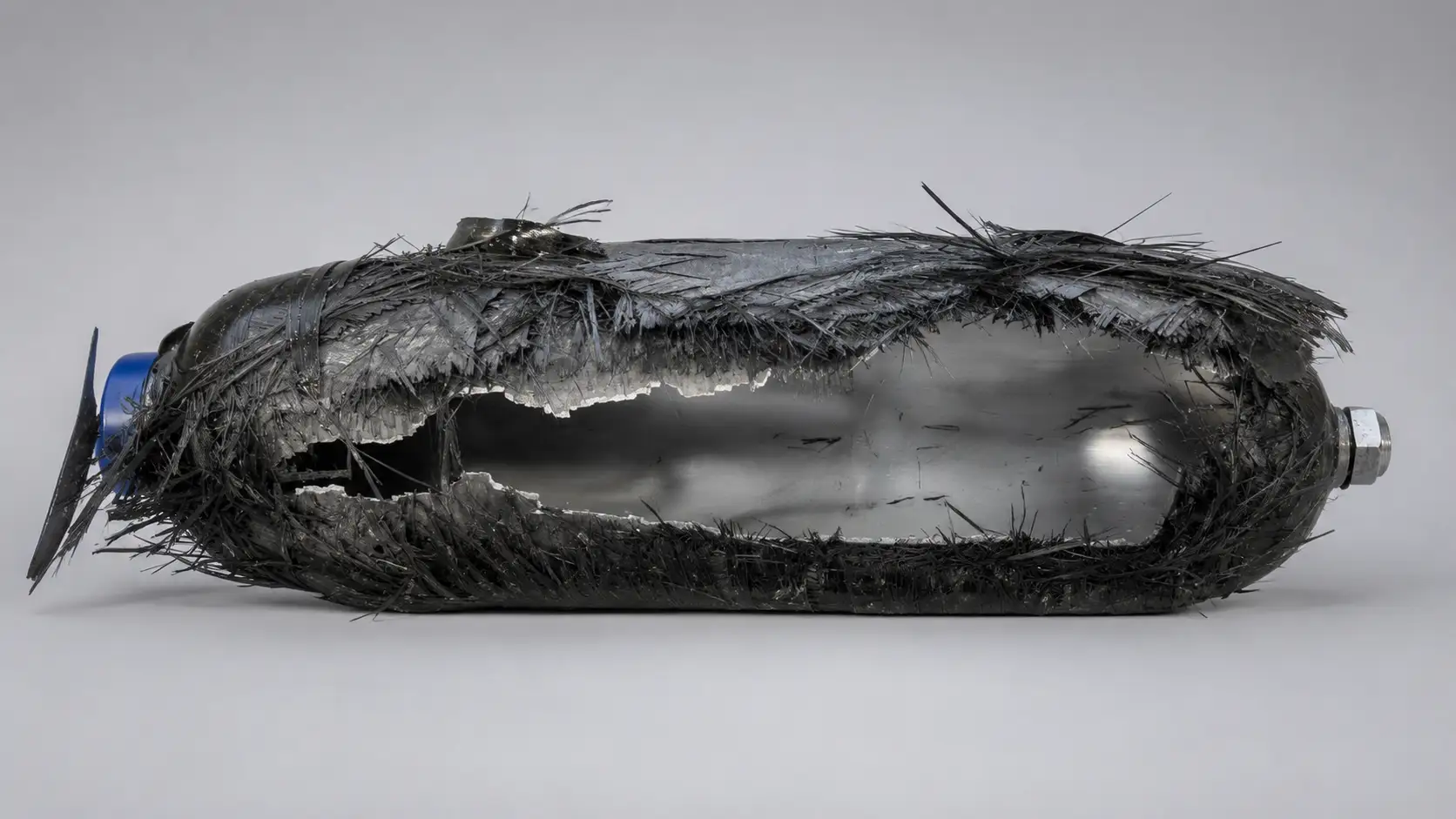 Pressure vessel destructive test article after testing.